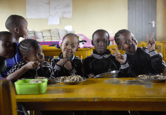 Students eating Food Serv Rice